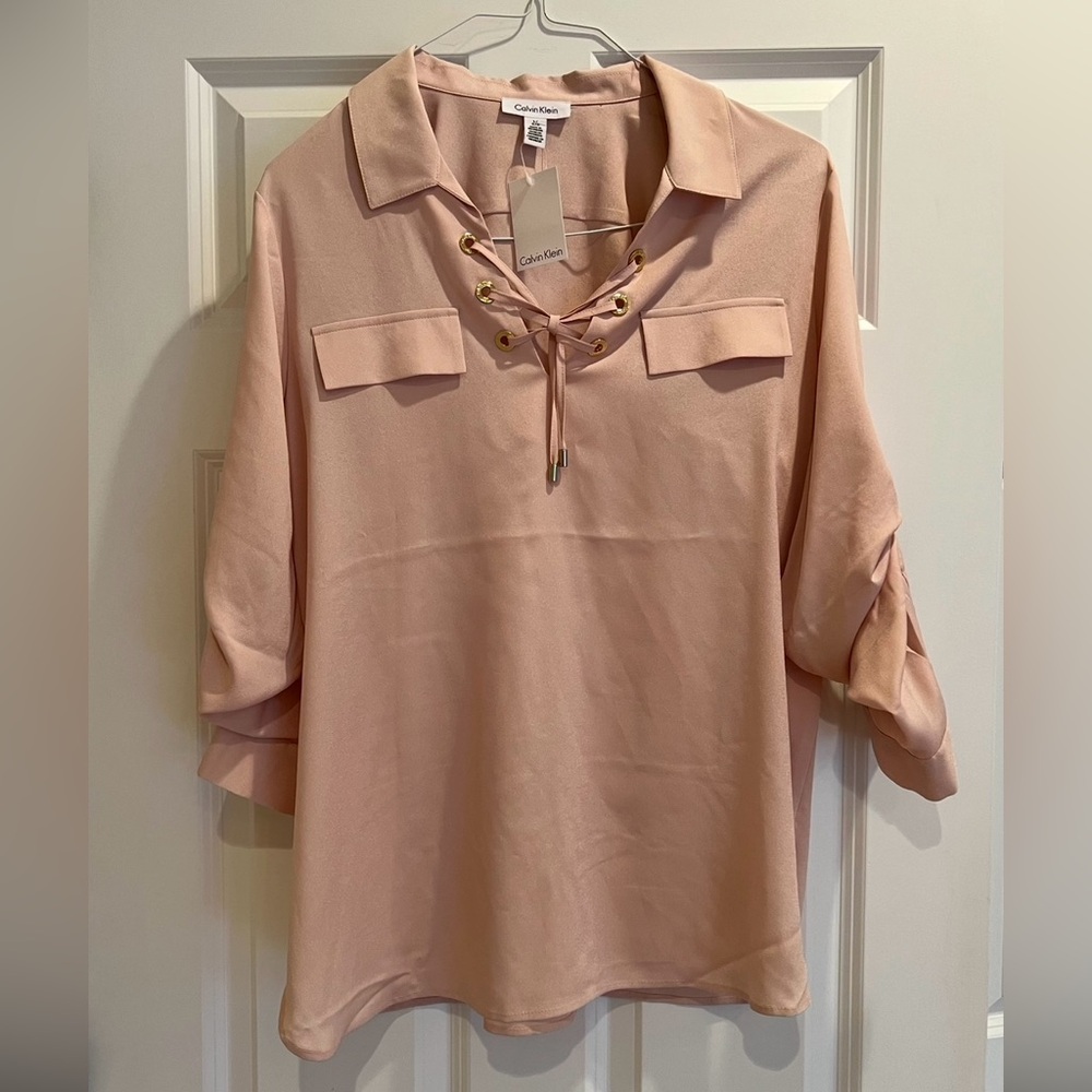 Calvin Klein pale pink top size large with adjustable sleeves